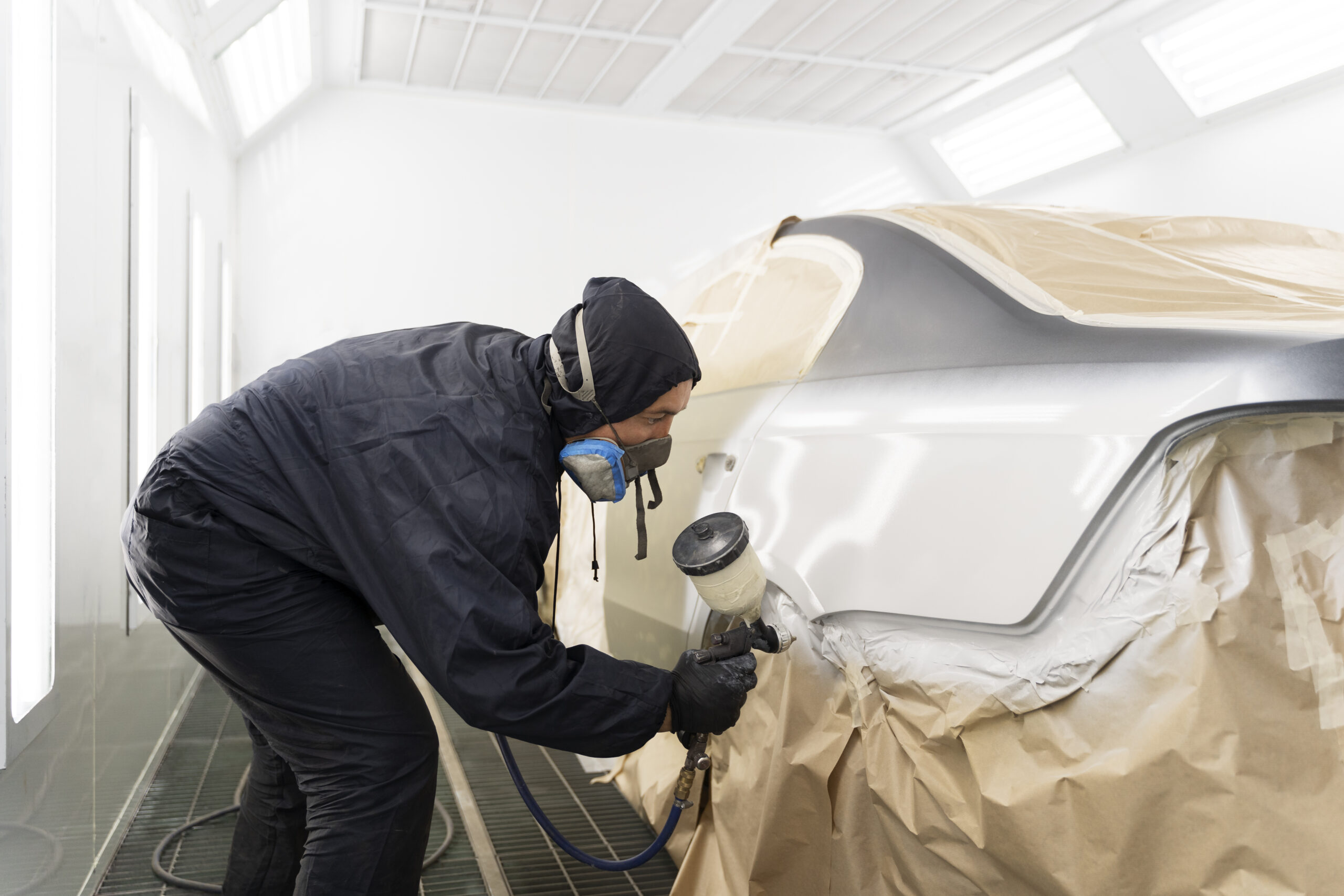 service-worker-painting-car-auto-service
